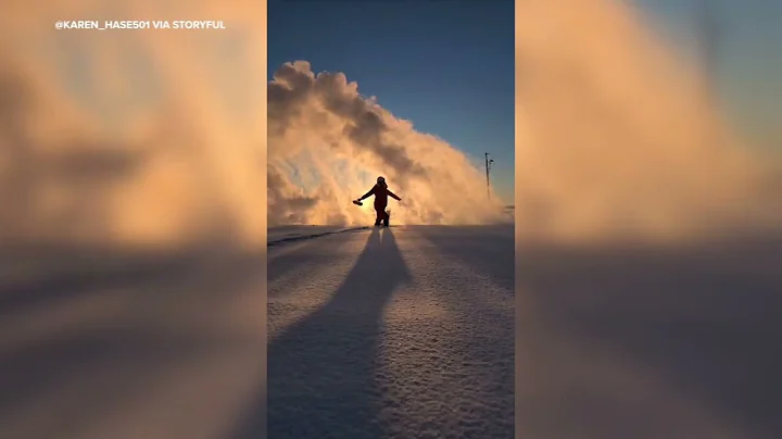 Water instantly freezes in the frigid air | VIDEO