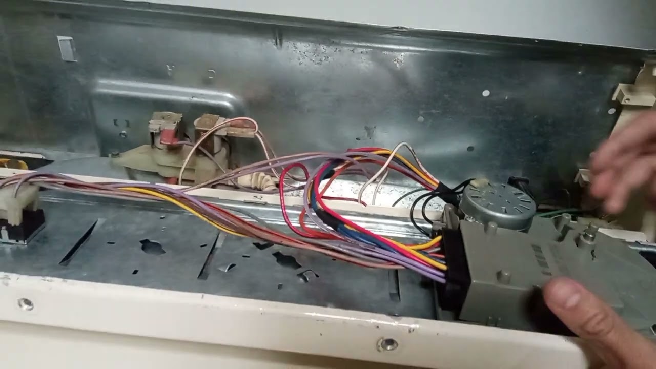 Cómo sacar timer de lavadora General Electric para cambio.