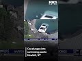 Car plunges into swimming pool on LI