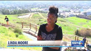 Cal Poly students paint Poly P Pan-African flag colors to celebrate Black History Month