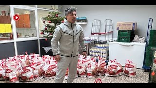 Loto milyoneri yoksulları gıda dağıttı