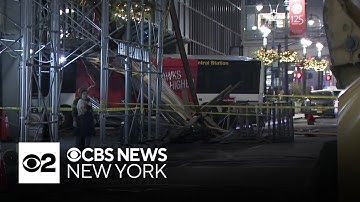 Bus crashes into scaffolding outside building in NYC