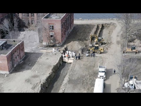 Mass burial captured by drone in New York City as morgues pushed to limit