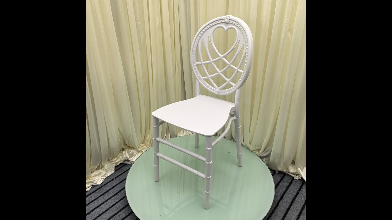Struggling to find stylish yet cheap wedding chairs?high quality white heart back PP plastic chair!
