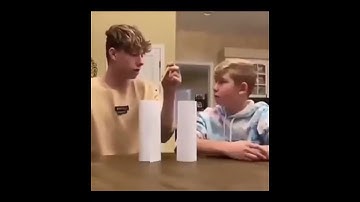 Kid faints as big brother does knife in hand prank