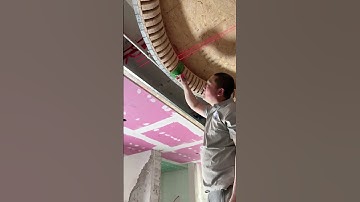 Carpenter demonstrates the lofting process of the suspended ceiling Sky Eye