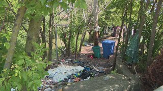 NW side residents battle growing trash from tent encampment