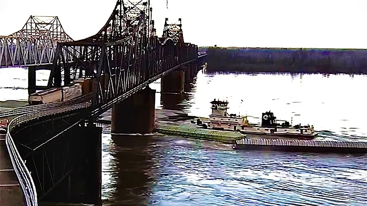 Towing vessel Chad Pregracke crashes into rail-bridge