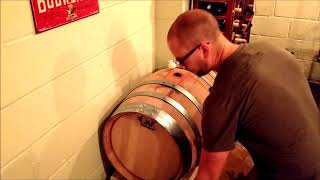 Topping up an Wine Barrel to Prevent Oxidation