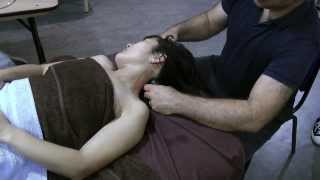 hot stone massage  neck and shoulders  supine