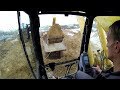Komatsu pc450 excavator loading dumpers with overburden cab view