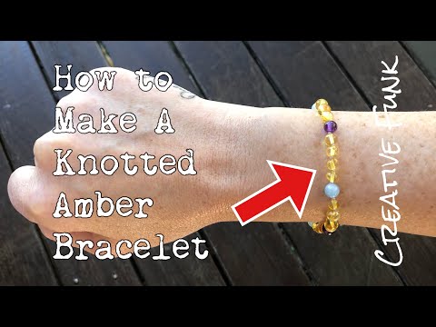 Video: Hoe Om Amber Armband Slaai Te Maak