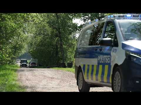 Estonian police van on a forest road in Põltsamaa municipality, where residents heard fighter jets and the drone exploding.