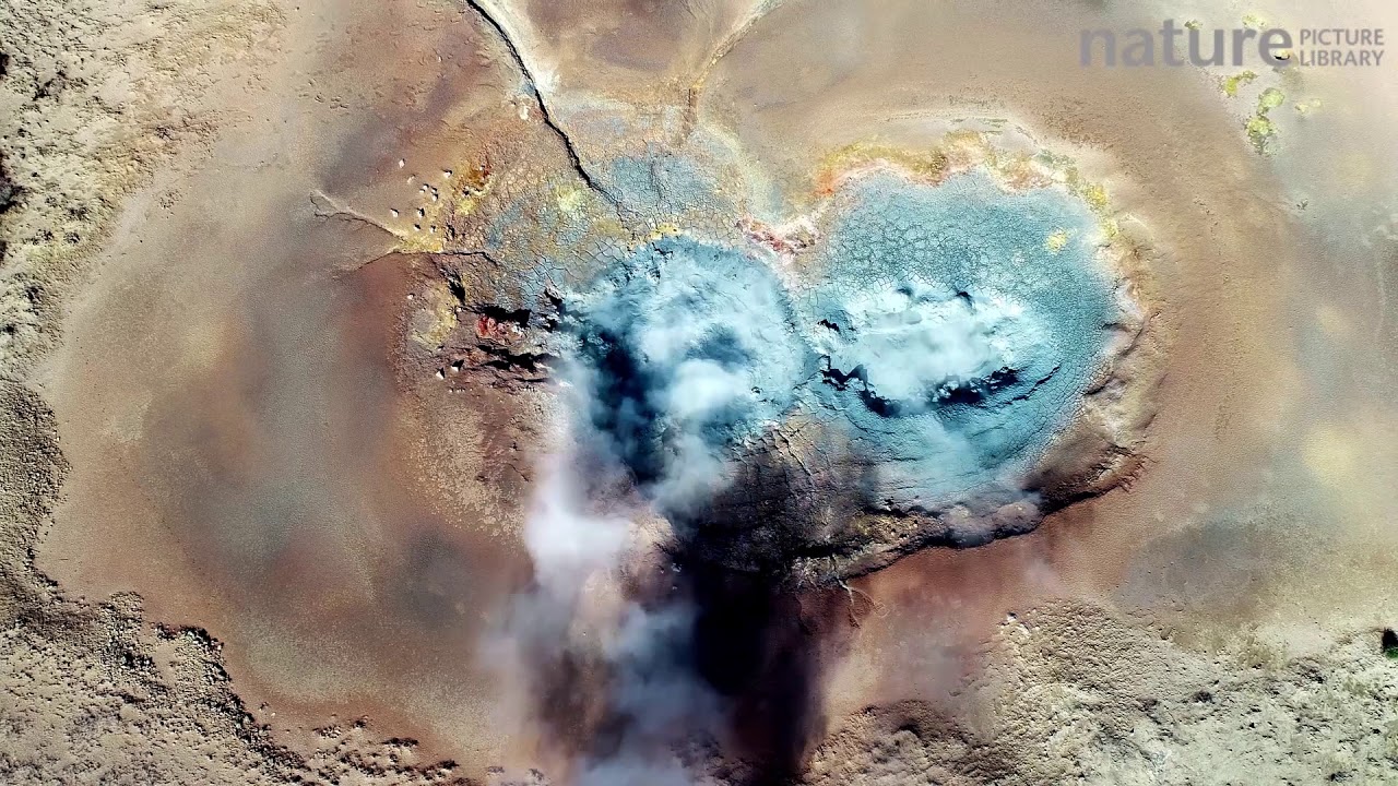 footage of chernobyl Aerial shot of steam geysers at Gunnhuver Hot Springs, Reykjanes Peninsula, Iceland, August 2018.