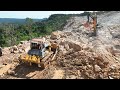 Next incredible high mountain road construction technology bulldozer pushing clearing stone