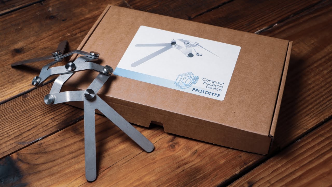 Compact X-Scissors Device: Compact joint for 3D spherical motion
