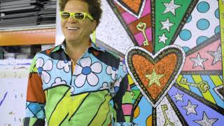 Artist romero britto meets with music mogul dj khaled at his home, to
unveil an exclusive artwork titled “blessings” for personal
collection.