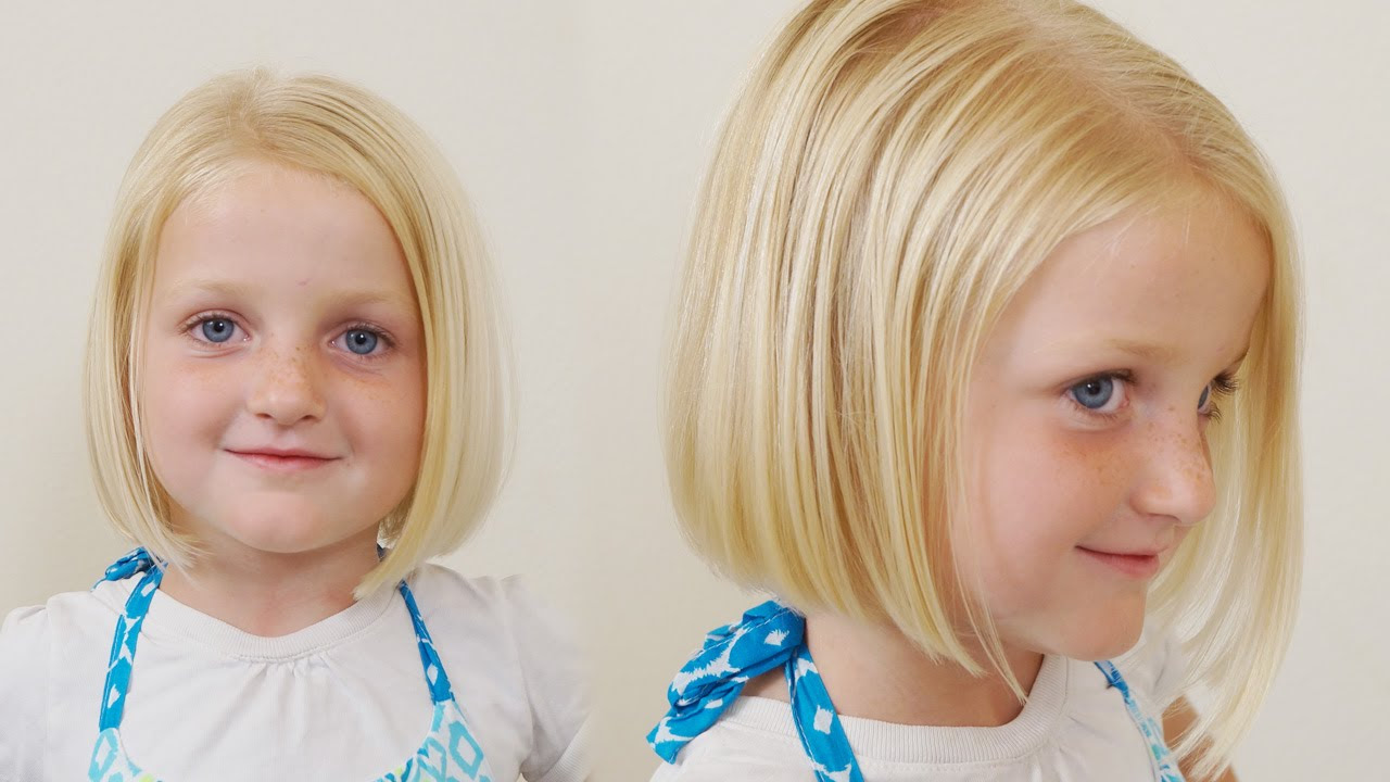 Between earlobe and chin bob with bangs for little girls