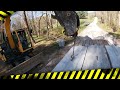 Hauling retaining wall block with Mack Truck - offload with excavator