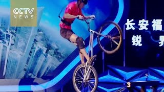 Mission Impossible: Challenger takes on steep stairs with bicycle