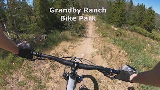 Riding a trail called Silky Johnson at the Grandby Ranch bike park Colorado