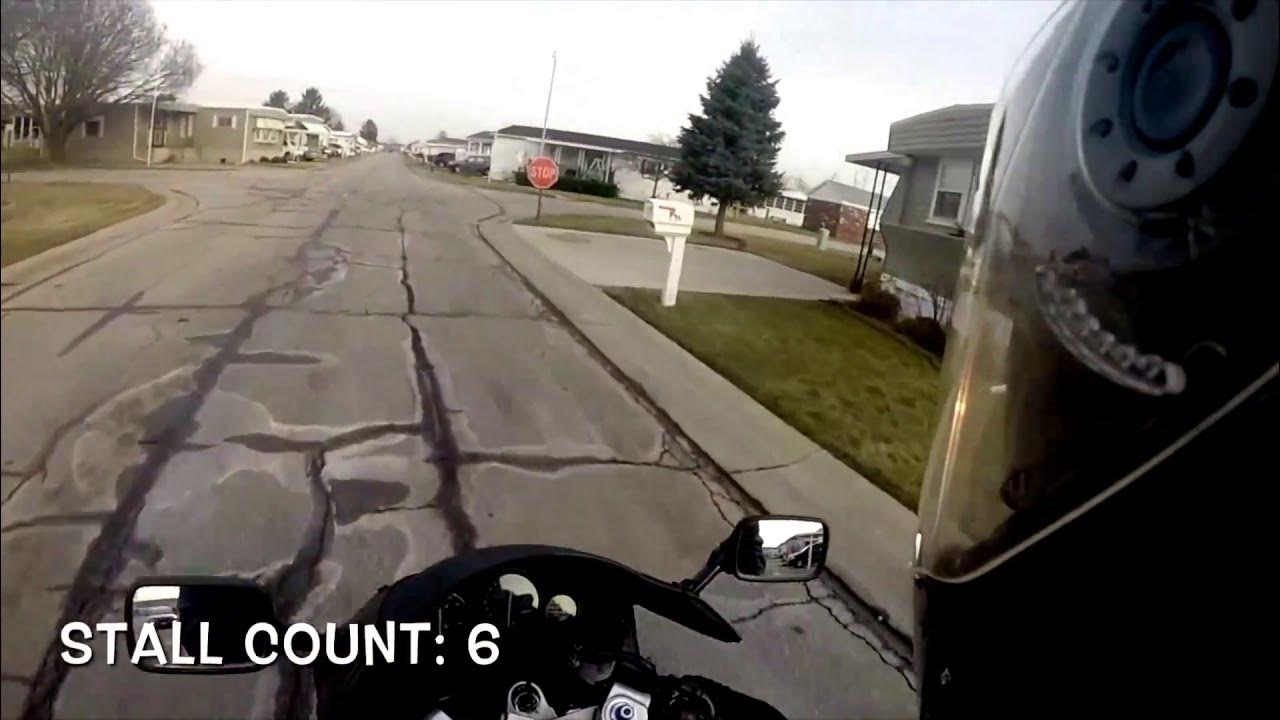 First time on motorcycle. Rides through a yard and stalls.. a lot