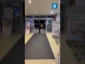Aggressive shoplifter smacks security with wet floor sign