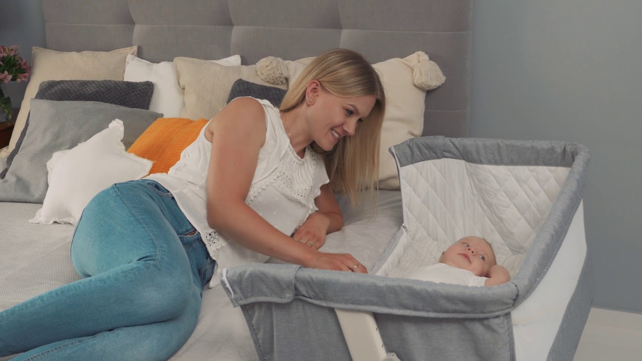 baby crib attached to parents bed