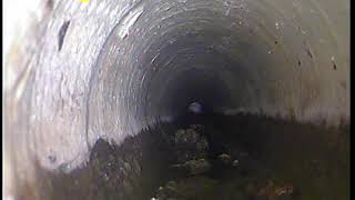 Overlapping patch repairs in a cast iron pipe line