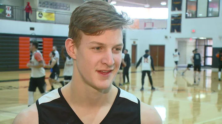 Indiana Tech's Lucas Lehrman and head coach Ted Al...