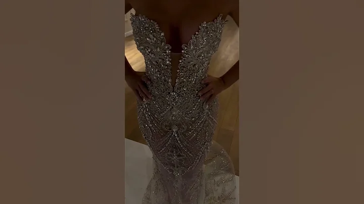 Share with a friend who would own the spotlight in this silver embellished mermaid gown! To order,