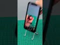 "How to create mobile phone stand from a cloth hanger" #shorts #handcraft #creative #usefultips