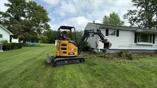 Landscape Demolition with an Deere 26G