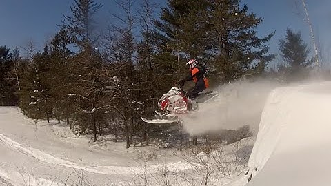 Polaris IQR and Skidoo REV doing some flatland drops.  PowerModz!