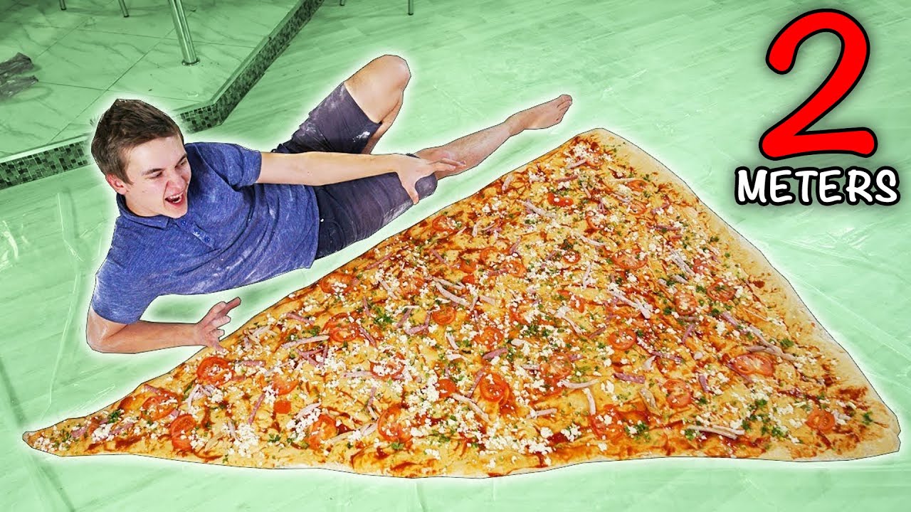 EATING THE WORLD’S LARGEST SLICE OF PIZZA - YouTube