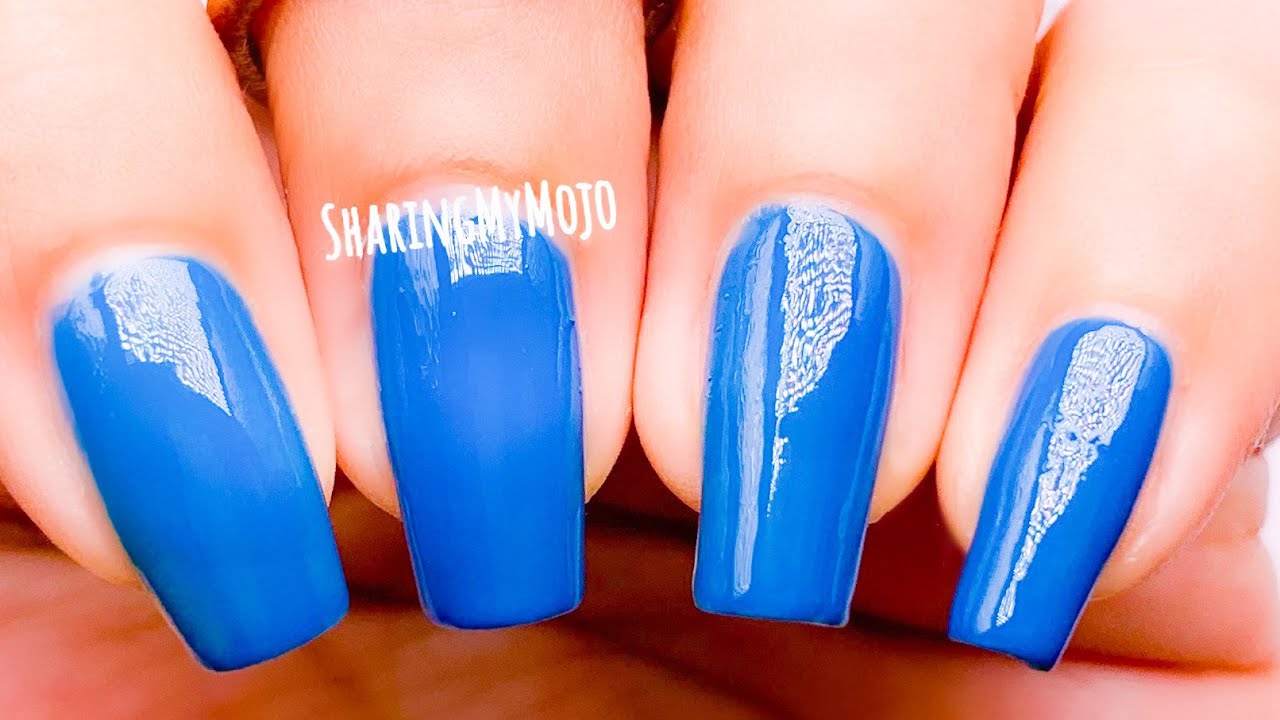 Nail Polish. Art Manicure. Modern style blue Nail Polish.Stylish pastel  Color Stock Photo - Alamy