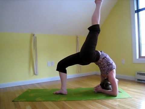 Practice of Eka Pada Viparita Dandasana (One-legged Inverted Staff Pose ...