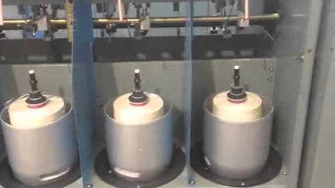 Two for one twisting machine for short fiber yarns HW363