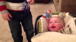 Baby Laughing At Party Horn