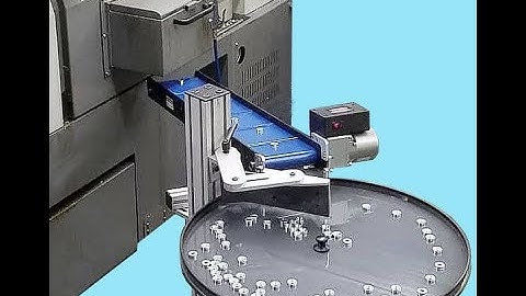 Uni-Mate(R) parts unloader & accumulator, from Mini-Mover Conveyors