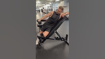 Single-Arm Dumbbell Lateral Raise on Incline Bench