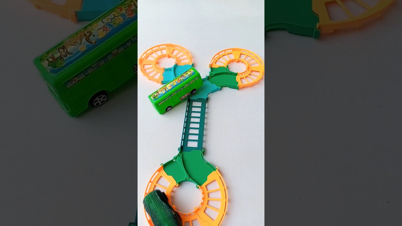 560 Car train slightly hit bus in circular track, 