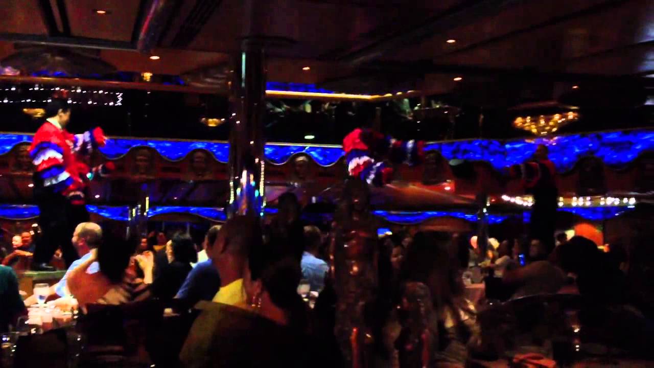 Carnival Cruise crew dancing at dinner