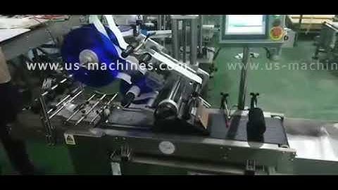 Automatic empty bag paging feeding top labeling machine testing video