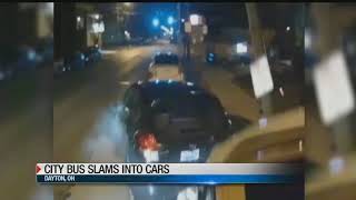 Witness says bus driver on phone before crashing in to cars