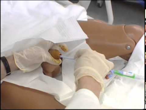 How do nurses perform a Foley catheter insertion?