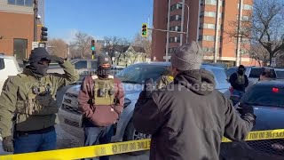 Tensions mount between federal agents and bystanders at site of reported shooting in Minneapolis