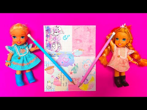 Elsa and Anna toddlers enjoy scrapbooking