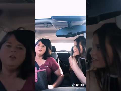 Daughter rolls moms window down in front of a guy at stoplight PRANK