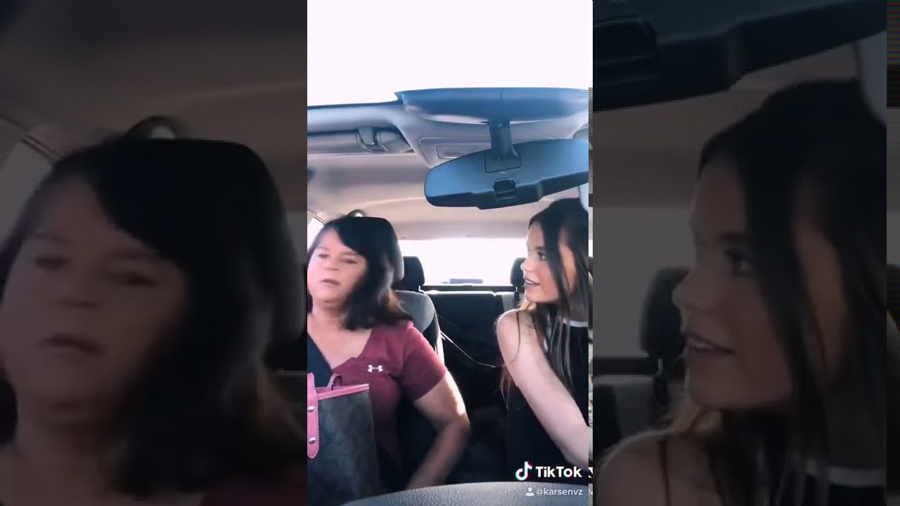 Daughter rolls moms window down in front of a guy at stoplight PRANK